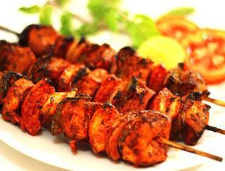 Chicken Tikka · Boneless chicken pieces marinated in aromatic spices and cooked in the tandoor.