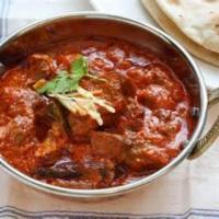 Lamb Rogan Josh · Aromatic lamb dish cooked with perfect blend of spices. Served with rice.