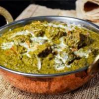 Lamb Sag · Boneless chunks of lamb in a delicately spiced spinach sauce, comes with rice