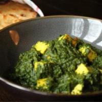 34. Saag Paneer · Fresh spinach and cottage cheese cooked in healthy herbs and spices. Vegetarian.