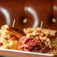 The Reuben Sandwich · House cooked corn beef with Miguel's secret seasoning. Swiss cheese, Thousand Island dressin...