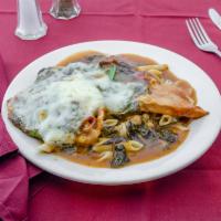Saltimbocca · Sauteed with spinach in marsala wine sauce topped with prosciutto, provolone cheese, and ser...