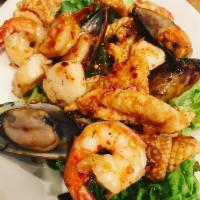 55. Fisherman Grill · Grilled shrimp, scallop, mussel, calamari and fish with Thai elephant home made chili sauce....