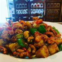 Spicy Cashew Chicken · Chef special dish. Crispy white meat chicken sauteed with house garlic chili sauce, pineappl...
