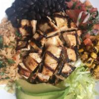 Baja Bowl Salad · Black beans, Spanish rice, shredded lettuce, salsa fresca, avocado and roasted corn served w...