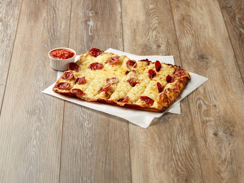 Pepperoni Sticks · 3/4 lb. of fresh baked bread sticks topped with pizza cheese and pepperoni. Served with a cup of marinara.