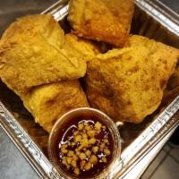 Golden Fried Tofu · Grounded peanuts with sweet chili sauce. Vegan.