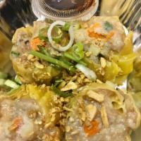 Thai Dumplings · Steamed chicken-shrimp with soy vinaigrette dipping sauce.