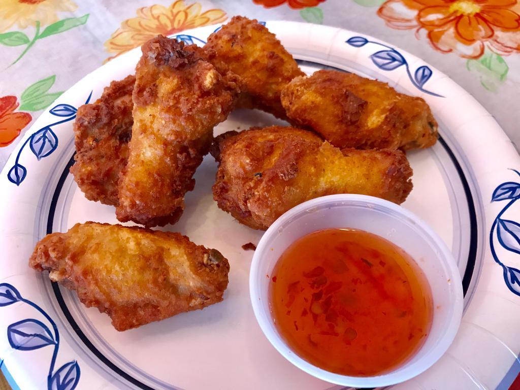 Thai Wings · Fried chicken wings with sweet chili sauce.