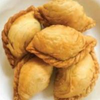 Curry Puffs กะหรี่ปั๊ปๆ (Home made) · Grounded chicken, potatoes, onions, curry powder with cucumber sauce.