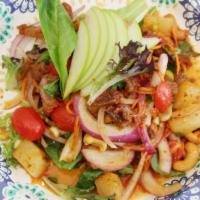 Crispy Duck Salad · Apples, pineapples, scallions, red onions, cherry tomatoes, cashew nuts in chili paste lime ...
