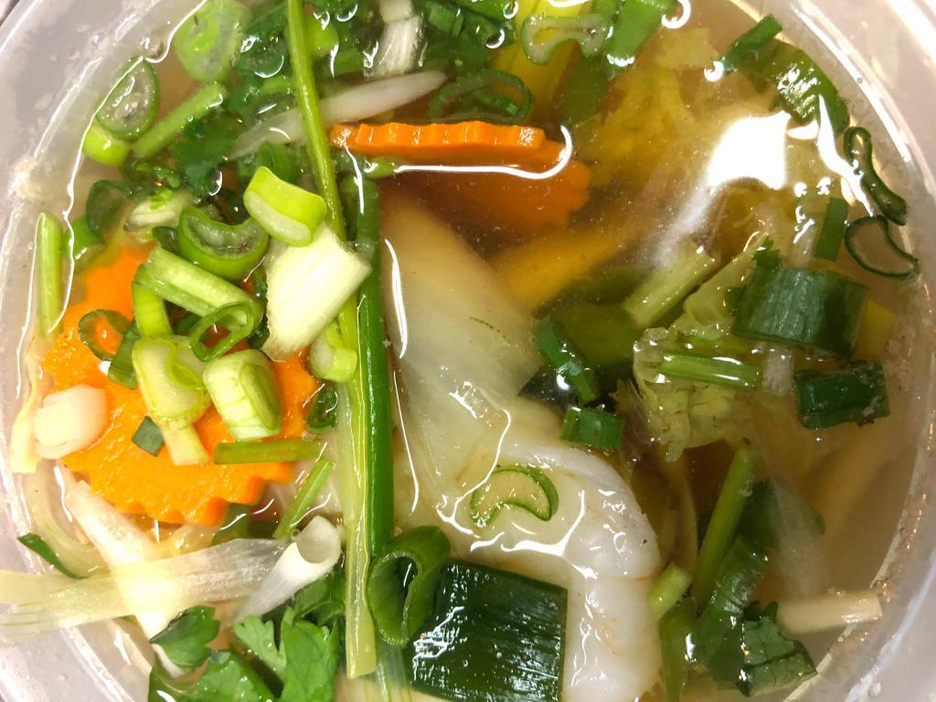 House Soup · Clear soup with mix vegetables.