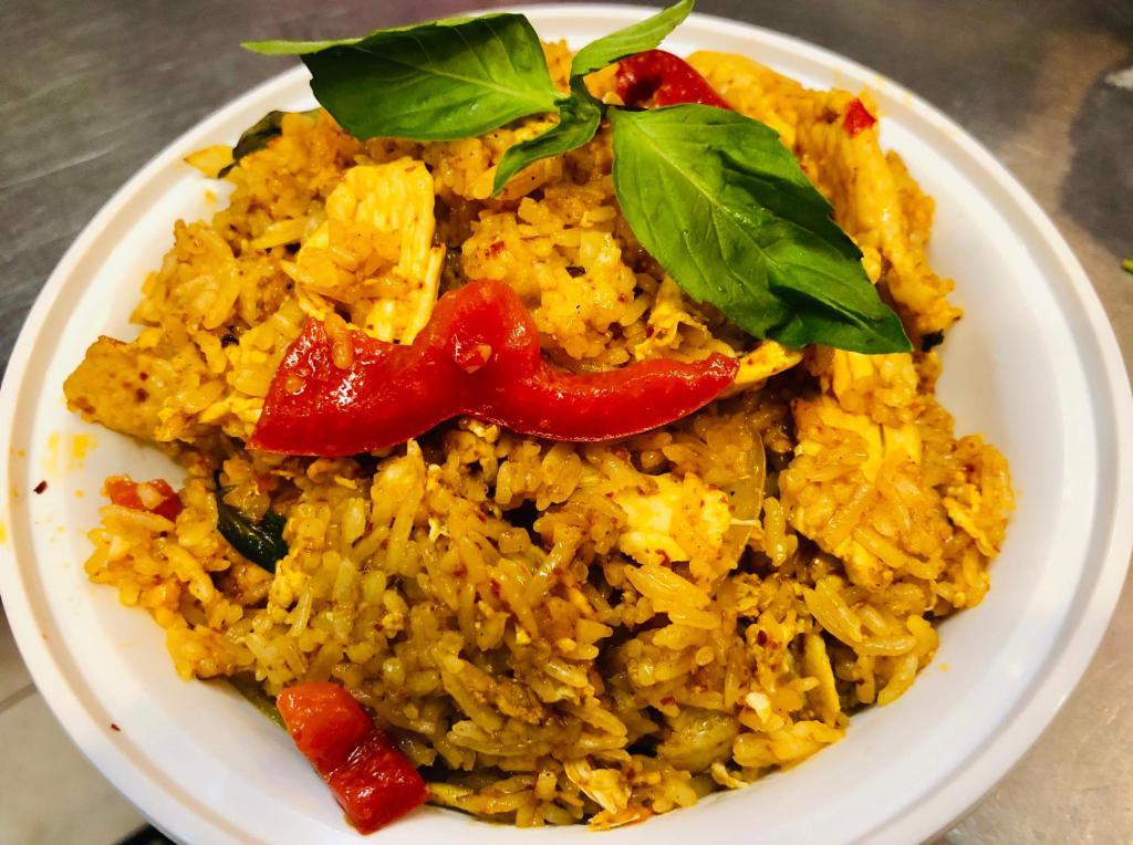 Basil Fried Rice ข้าวผัดกะเพรา · Onions, bell peppers, carrot, basil, chili paste and egg. Spicy.