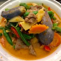 Red Curry แกงแดง · Coconut curry, eggplants, string beans, bell peppers, bamboo shoots and basil leaves. Served...