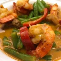 Panang Curry · Coconut curry, bell peppers, lime leaves and string beans. Served with jasmine rice. Spicy.