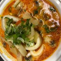 Tom Yum Talay · Creamy seafood soup. Mix seafood (shrimp, squid) in tom yum soup with milk. Served with jasm...