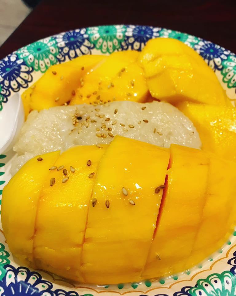 Mango Sticky Rice · Coconut sticky rice serve with yellow mango topping with sesame seed