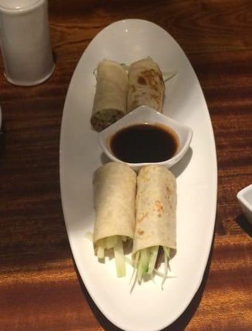 Roast Duck Wrap · Shredded duck with vegetables and seafood sauce.