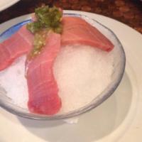 White Tuna Fusion · 8 pieces seared white tuna with house spice, black pepper, plum and wasabi sauce. Finished w...