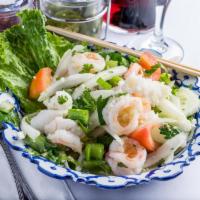 Seafood Medley Salad · Combination of prawns, calamari layered in with fresh cucumber, onions, tomatoes, celery, ci...