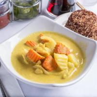 Yellow Curry Lunch · Potatoes, onions and carrots simmered in mild yellow curry and coconut milk. Spicy.