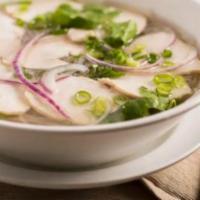 33. Chicken Noodle Soup · Dished up with rice noodles and topped with cilantro, green and purple onions. Served with a...