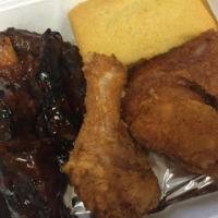 Dark Meat Chicken and Rib Combo Meal · 2 pieces fried chicken and 3 BBQ ribs with fries, coleslaw or mac, cornbread and can of soda.