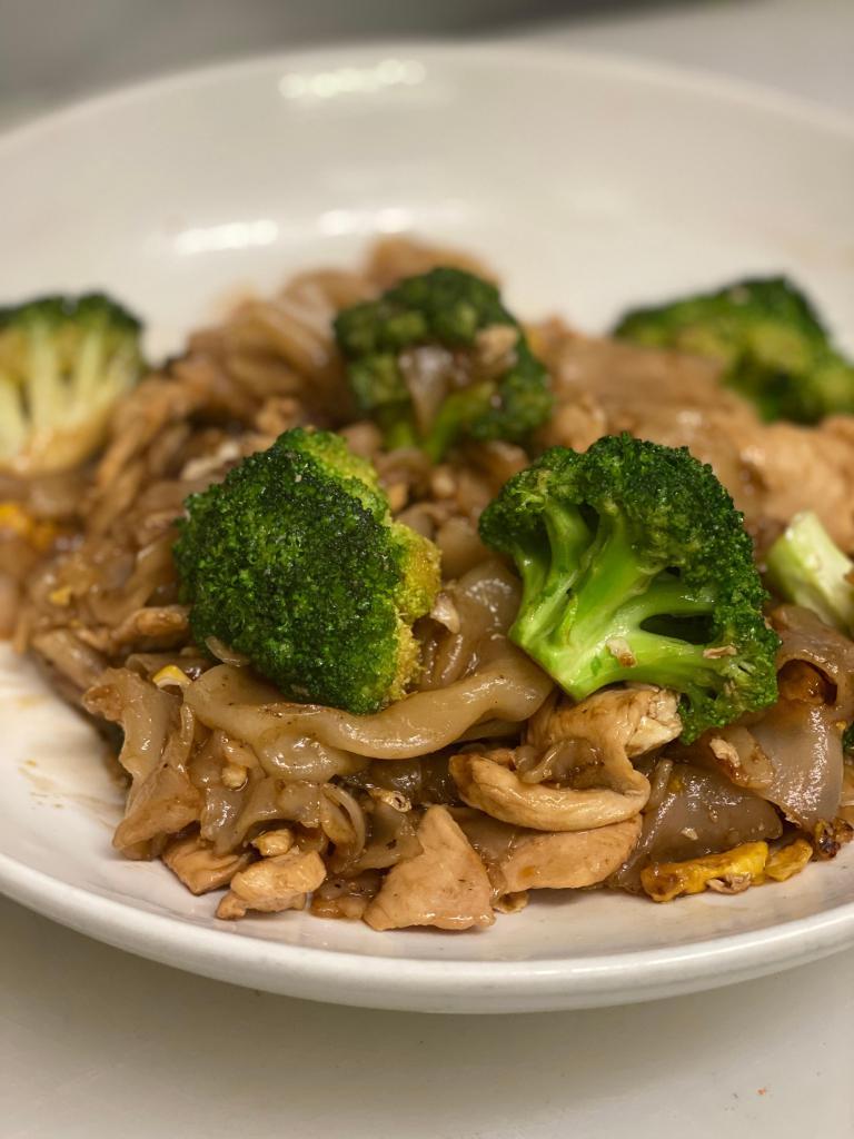 N2. Pad See Eiw · Flat rice boodles sauteed with choice of meat, egg, broccoli and sweet soy sauce.