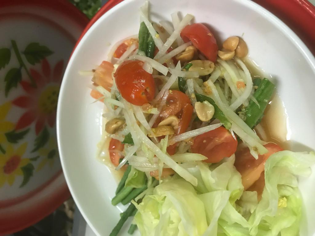 Y2. Papaya Salad · Papaya salad mixed with dried shrimp, long beans, peanuts, tomatoes and fish sauce. Hot and spicy.
