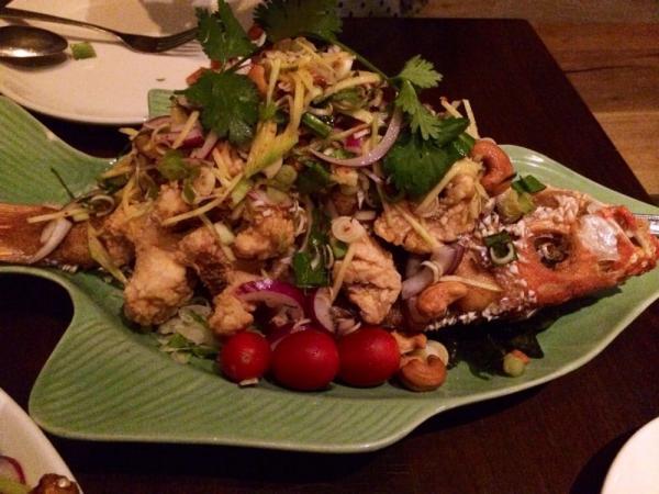 M7. Fish in the Garden · Fried whole red snapper topped with cashew nuts, green mango, lemongrass, lime leaf, onions and scallions, mixed with a lime and chili dressing. Hot and spicy. served with side of jasmine rice. 