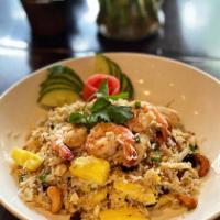 R7. Pineapple Fried Rice · Fried rice with CHOICE of meat cashew nuts, egg, green peas, onions, pineapple and raisins. ...