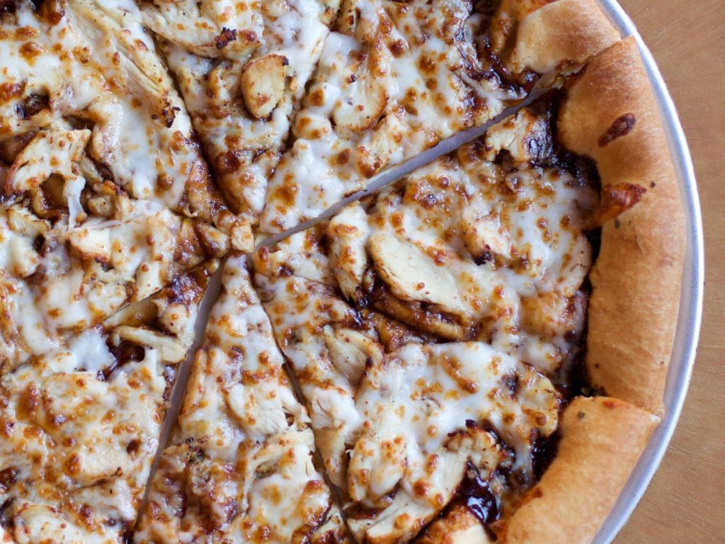 BBQ Chicken · A base of authentic barbecue sauce topped with mozzarella and tender strips of grilled chicken breast.