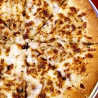 Alfredo Chicken · A base of creamy Alfredo sauce topped with mozzarella cheese and tender strips of grilled ch...