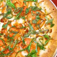 Margharita Pizza · Olive oil, garlic and oregano sauce, mozzarella, fresh tomato and fresh basil.