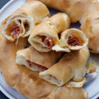 Pepperoni Rolls · Pepperoni and smoked provolone. Rolled up in hand tossed original crust and served with home...