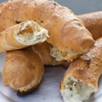 Chee-z Rolls · A cheesier, no-meat version of our signature roll with smoked provolone, mozzarella, Parmesa...