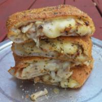 Chicken Cheesesteak Stromboli · Garlic chicken, mozzarella and white American cheese. Folded in hand tossed original crust, ...