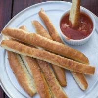Breadstyxz · Delicious hand-tossed crust cooked to perfection, brushed with garlic butter sauce, then cut...