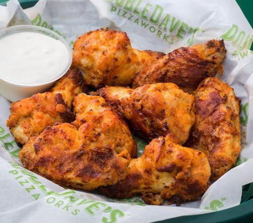 Bone-In Wings · 8 succulent chicken wings smothered in your favorite mouth-watering sauce (Mild, Hot, or Barbeque), served with either homemade Ranch or blue cheese dressing.