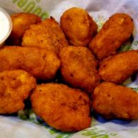 Boneless Wings · Tender chunks of all-white meat boneless chicken, lightly breaded and sauced, with your choi...