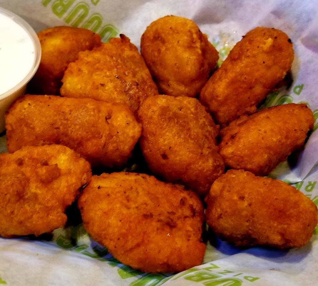 Boneless Wings · Tender chunks of all-white meat boneless chicken, lightly breaded and sauced, with your choice of Ranch or Blue Cheese dressing on the side.