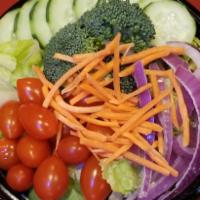 Garden Salad · A colorful salad that's as attractive as it is healthy and tasty! A bed of romaine and icebe...