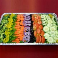 Catering Salad · A deep, full-size lasagna pan filled with a bed of fresh lettuce and rows upon rows of your ...