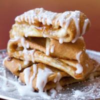 Apple Strudel · Our hand-tossed dough stuffed with chunky apple filling, cooked to a golden-brown, then spri...