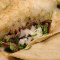 Bistec Tacos *Receta Artesanal* · Steak Tacos, onion, Cilantro..