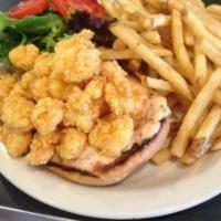 Shrimp Po Boy · Cajun spiced shrimp, Creole mayo, field greens & sliced tomatoes on a butter toasted brioche...