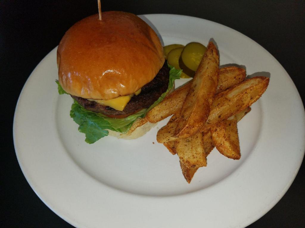 ANGUS BURGER W/ FRIES · OUR BEST BURGER EVER. JUICY 8 OZ ANGUS BEEF BURGER SERVED IN A POTATO ROLL, TOPPED WITH HOME MADE SAUCE, LETTUCE, TOMATO, ONIONS AND BACON AND PAIRED WITH FRENCH FRIES.