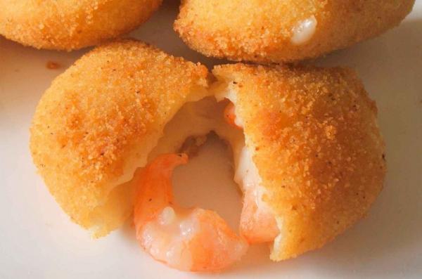 SHRIMP RISOLES · Home made dough stuffed with cooked shrimp seasoned to our own recipe