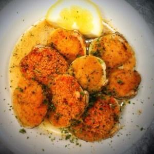 8 Piece Baked Clams · Olive oil, garlic, parsley, bread crumbs, white wine and lemon sauce.