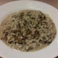 Risotto ai Funghi · Arborio rice with mixed mushrooms.